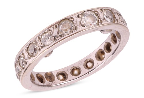 Lot 190 - A diamond-set full eternity ring, grain-set...