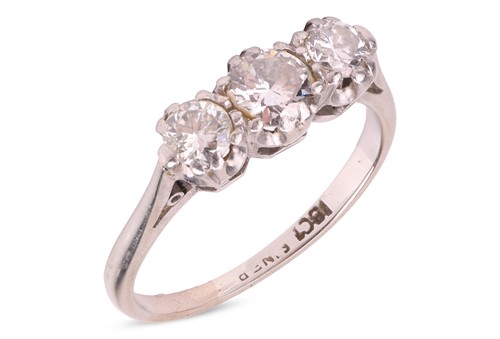 Lot 280 - A three-stone diamond-set ring, composed of...