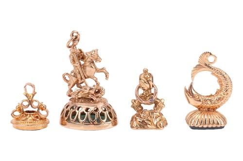 Lot 323 - A Victorian gold and carnelian seal, foliate...