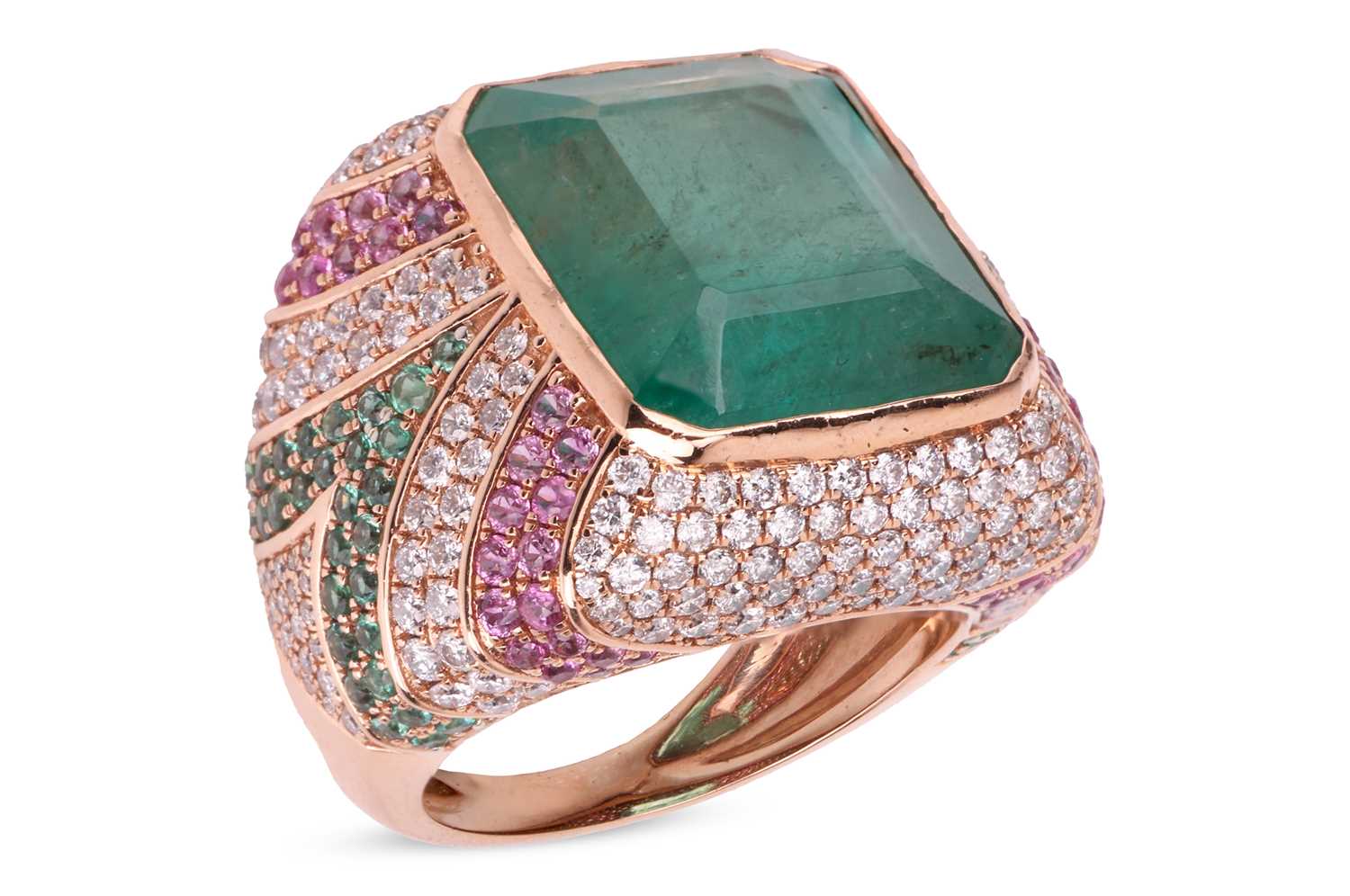 Lot 202 - An emerald, pink sapphire and diamond cocktail...