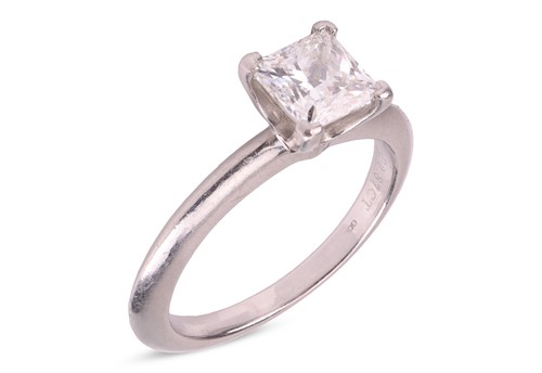 Lot 217 - Tiffany & Co - a diamond solitaire ring,...