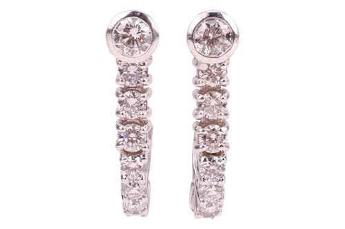 Lot 105 - A pair of diamond-set semi-hoop earrings,...