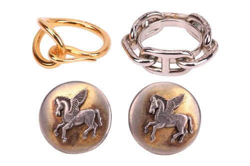 Lot 69 - Hermès - a pair of Pegasus clip-on earrings,...