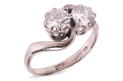 Lot 111 - A diamond-set toi et moi ring, composed of two...