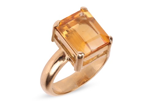 Lot 90 - A citrine dress ring, claw-set with a...