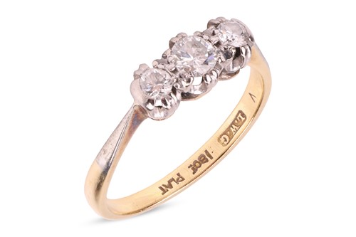 Lot 175 - A diamond-set three-stone ring, claw-set with...