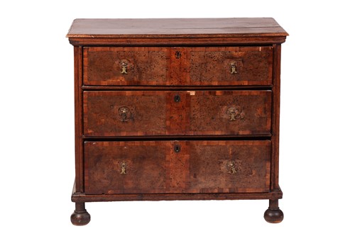 Lot 25 - A William and Mary oak and burr walnut chest...