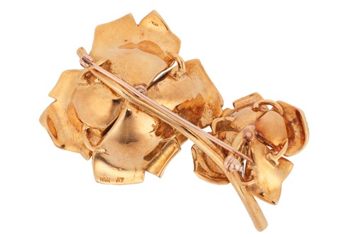 Lot 67 - A floral brooch set with diamonds and enamel,...