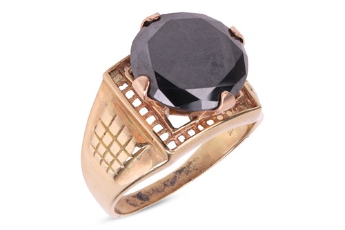 Lot 253 - A black diamond solitaire ring, comprising a...