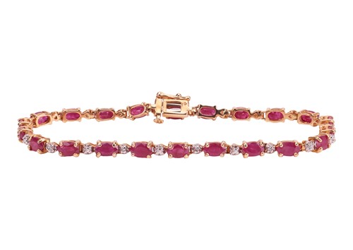 Lot 94 - A ruby and diamond line bracelet, comprising a...