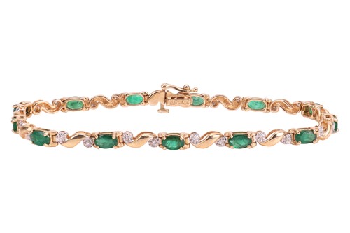 Lot 243 - An emerald and diamond line bracelet,...