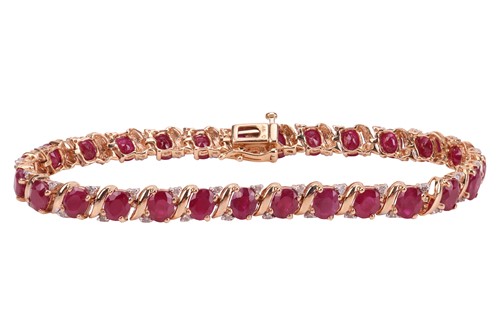 Lot 145 - A fracture-filled ruby and diamond-set...