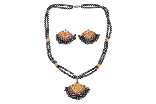 Lot 230 - A hematite bead necklace and earrings suite;...