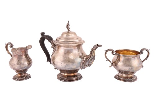 Lot 418 - A heavy-gauge silver three-piece teaset,...