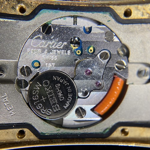 Lot 201 - Cartier – An ‘18K’ Tank Americaine Wristwatch...