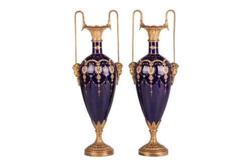 Lot 158 - A pair of Sevres-style porcelain vases with...