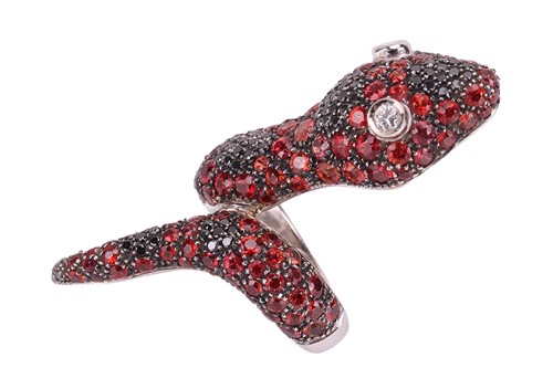 Lot A black diamond and andesine serpent ring by...