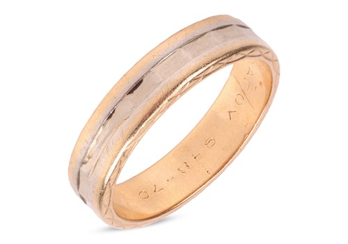 Lot 261 - A bi-coloured wedding band, with a recessed...