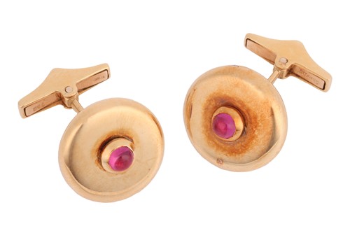 Lot 91 - A pair of ruby-set cufflinks, of polished disc...