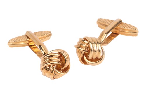 Lot 234 - A pair of knot cufflinks, in yellow metal...