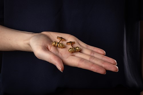 Lot 58 - A pair of Etruscan-style cufflinks, of hollow...