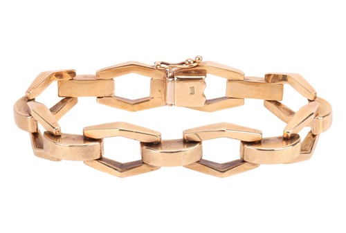 Lot 143 - An angular link bracelet, composed of stylised...
