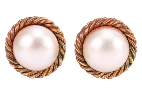 Lot 264 - A pair of mabé pearl earrings, each centred...