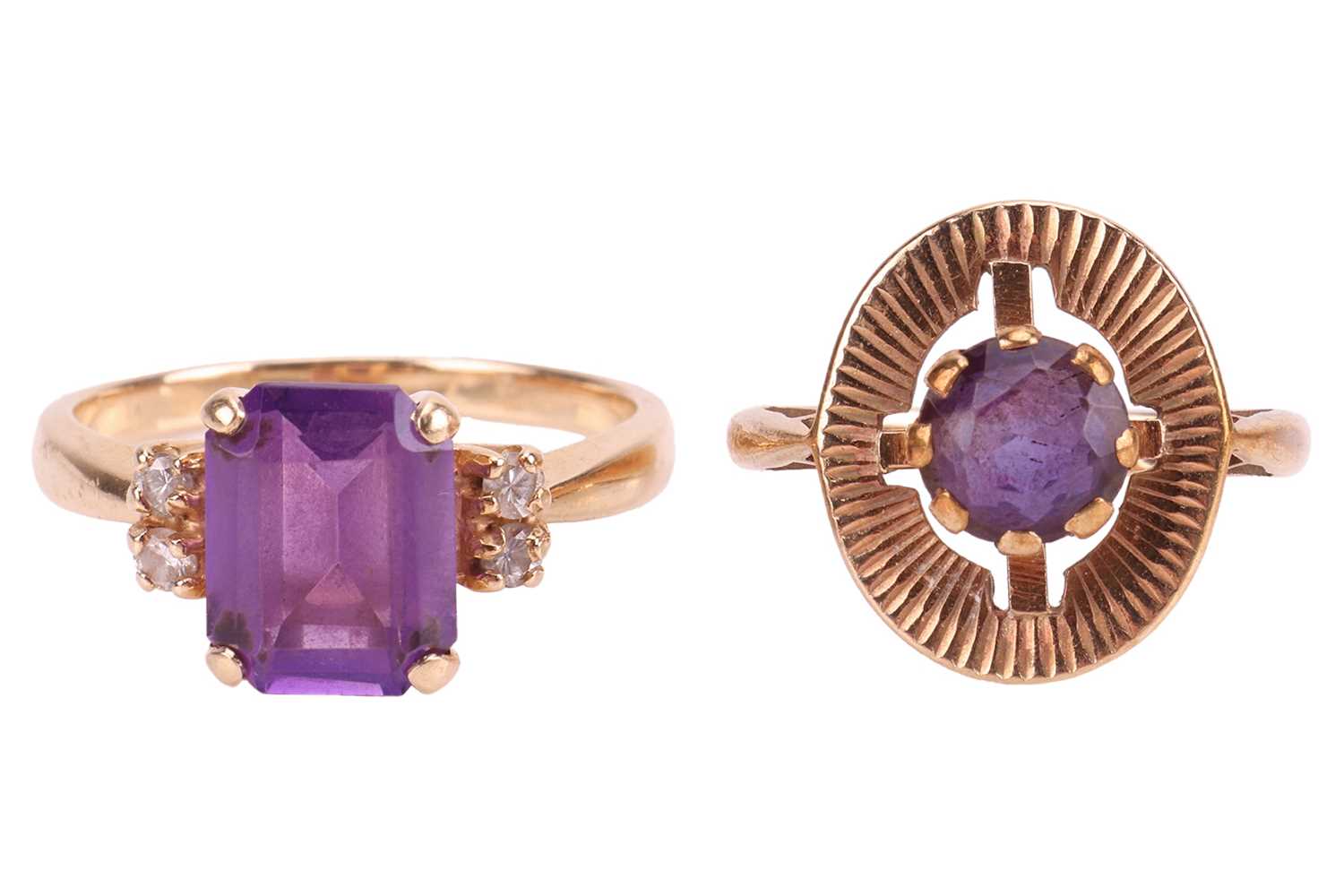 Lot 257 - Two amethyst-set rings, the first featuring