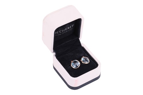 Lot 305 - Bucherer - a pair of blue topaz earrings, each...