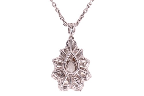 Lot 295 - A diamond cluster pendant on chain, with an...