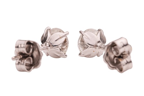 Lot 102 - A pair of diamond stud earrings, each earring...