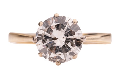 Lot 103 - A diamond solitaire ring in 18ct gold,...