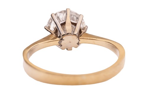 Lot 103 - A diamond solitaire ring in 18ct gold,...