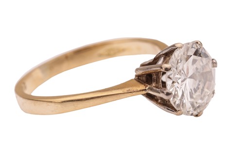 Lot 103 - A diamond solitaire ring in 18ct gold,...
