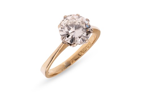 Lot 103 - A diamond solitaire ring in 18ct gold,...
