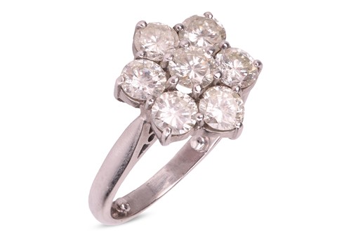 Lot 251 - A diamond floral cluster ring in 18ct white...