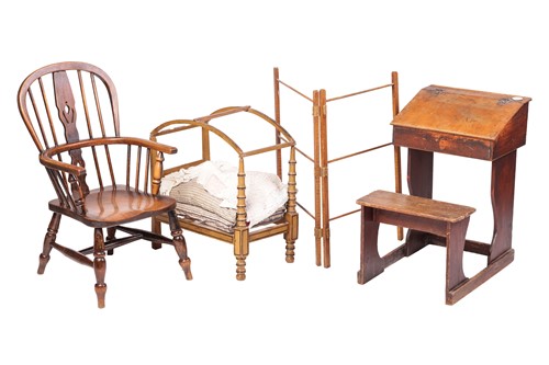 Lot 31 - An early 20th century child's Windsor armchair,...
