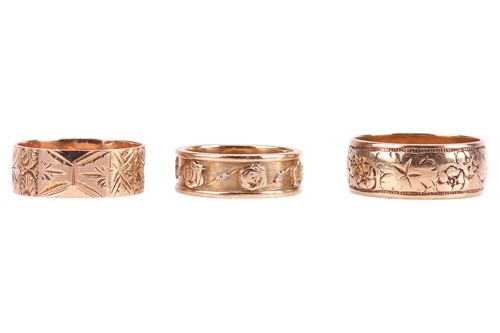 Lot 195 - Three band rings; The first a 9ct yellow gold...