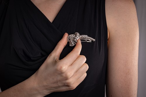 Lot A diamond-set clip brooch, circa 1940s, of...