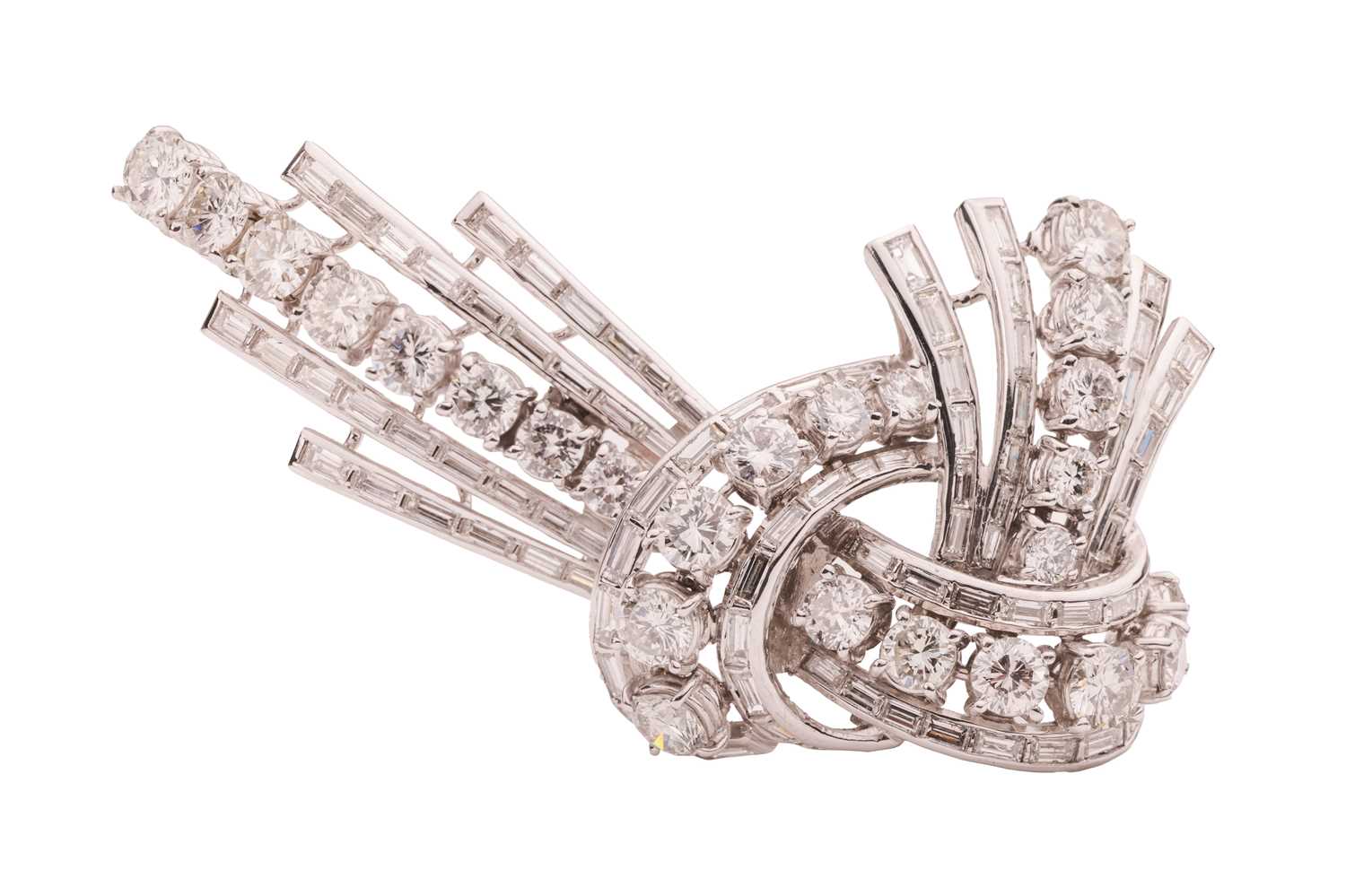Lot A diamond-set clip brooch, circa 1940s, of...