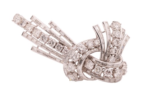 Lot A diamond-set clip brooch, circa 1940s, of...