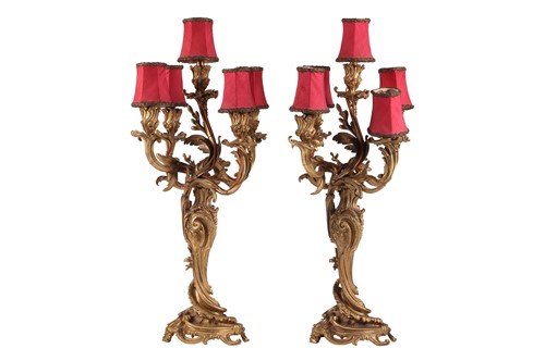 Lot A pair of Louis XV style gilt bronze...