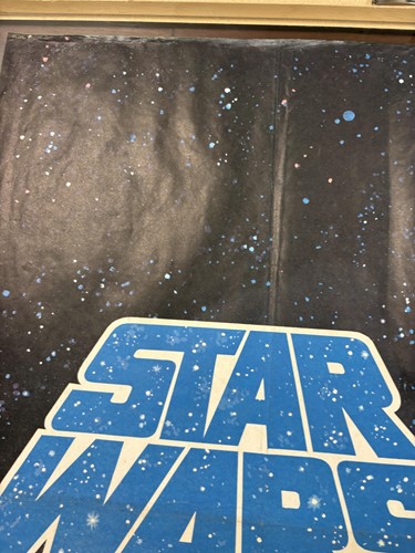Lot 137 - A rare 1977 Star Wars British quad poster, the...