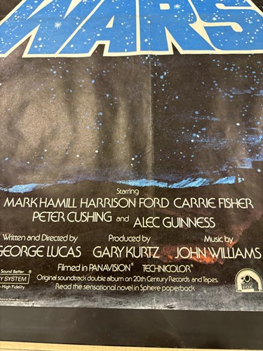 Lot 137 - A rare 1977 Star Wars British quad poster, the...