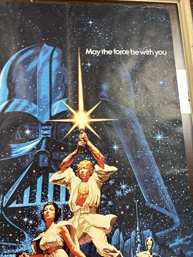 Lot 137 - A rare 1977 Star Wars British quad poster, the...
