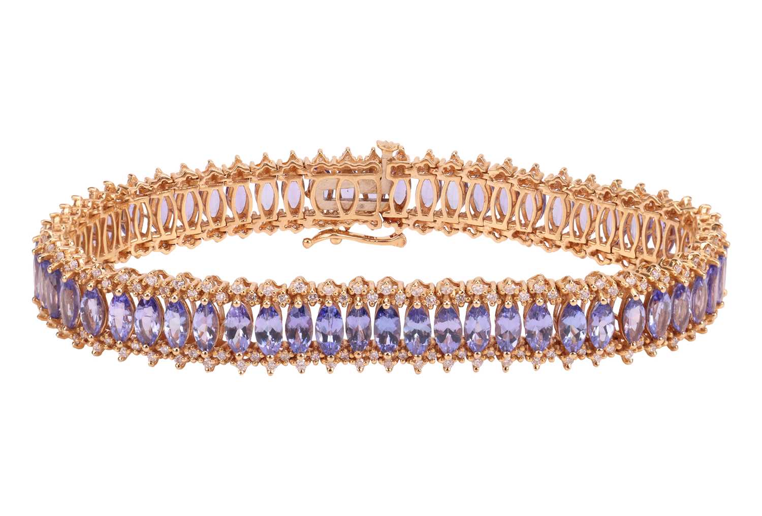 Lot 152 - A tanzanite and diamond-set bracelet, by...