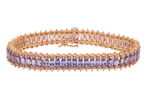 Lot 152 - A tanzanite and diamond-set bracelet, by...