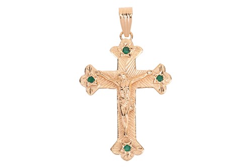 Lot 140 - A gem-set crucifix pendant in 18ct yellow gold,...