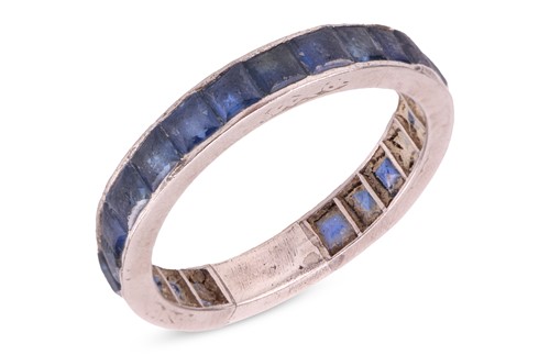 Lot 117 - A sapphire eternity ring, featuring twenty-two...