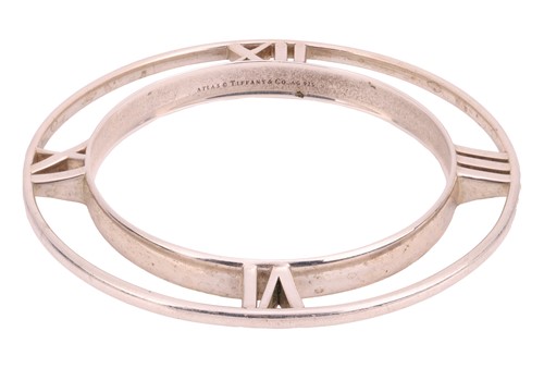 Lot 313 - Tiffany & Co. - An Atlas Tapered bangle in...